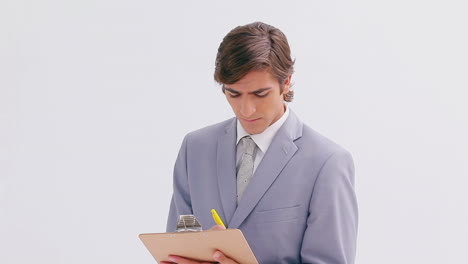 Businessman-holding-a-clipboard