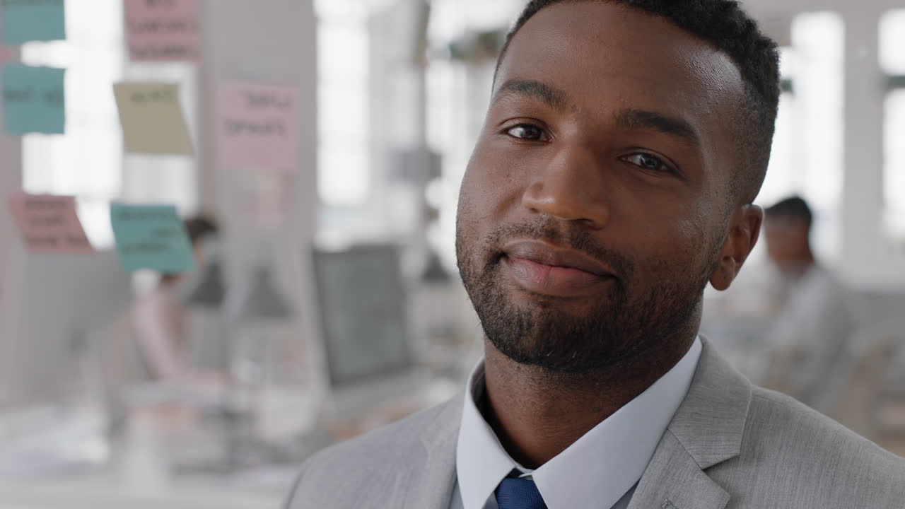 portrait happy african american businessman smiling confident entrepreneur enjoying successful startup company proud manager in office workspace