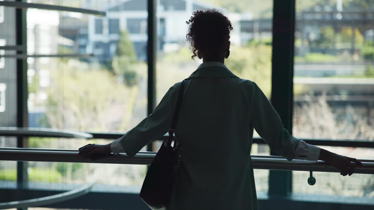 Woman looking out at city view