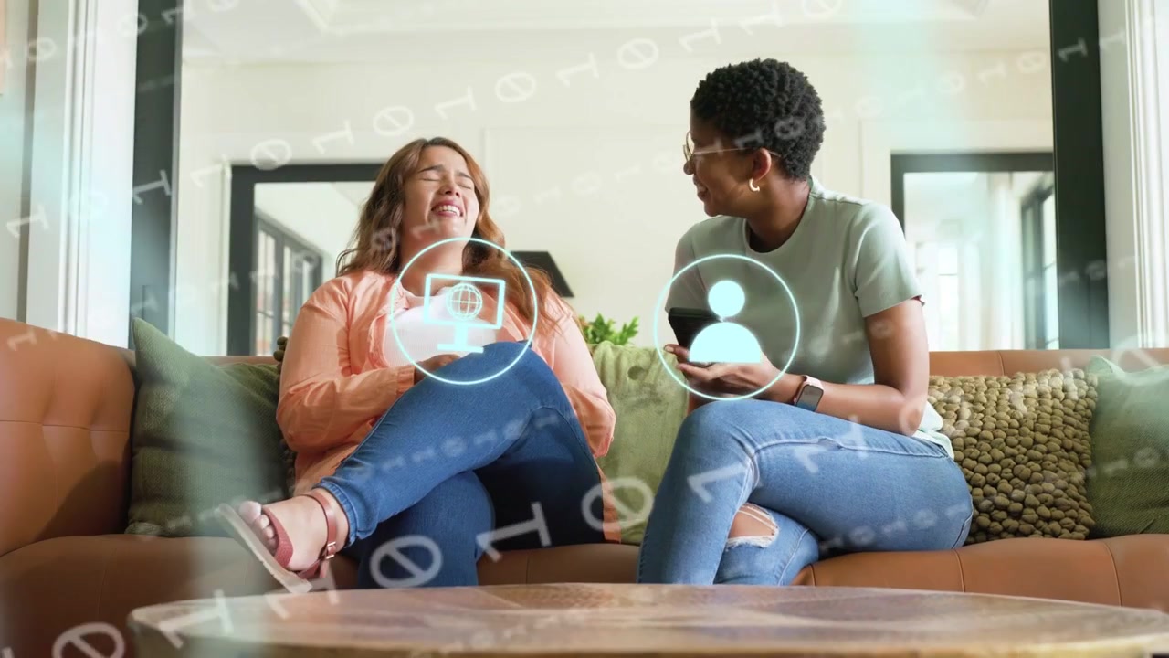 Two Happy Women Using Smartphones with Digital Overlays on a Couch