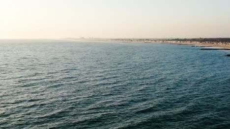 4k drone ft huntington beach coast during sunset