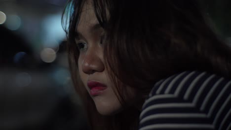 pensieve young woman at night