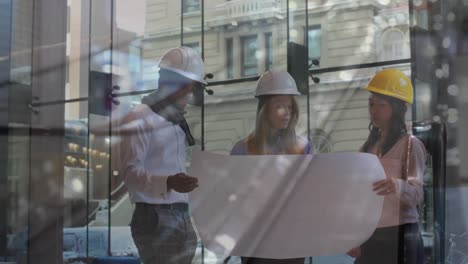 animation of cityscape over business people talking in modern office