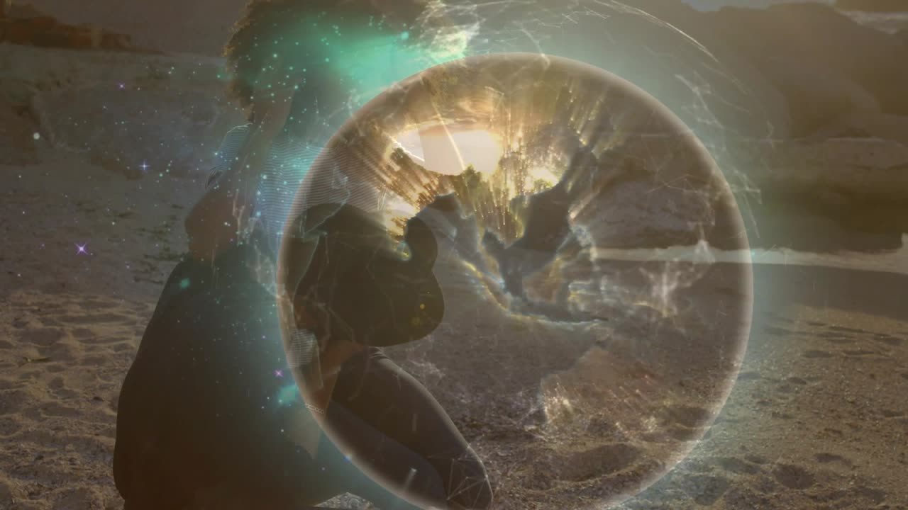 woman wearing dress approaching beach brushing sand summoning holographic globe for technology