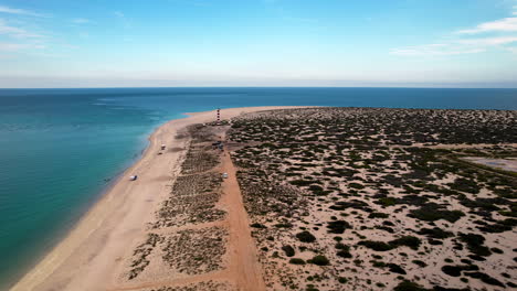 drone shot and front view the window beach lighthouse in baja california sur mexico