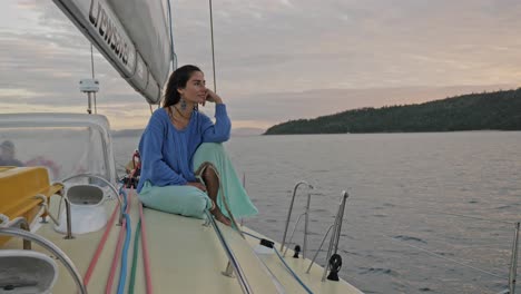 Young-Caucasian-Girl-Looking-At-Scenic-Island-With-Calm-Ocean---Girl-Smile-At-Camera-During-Vacation-Trip-at-Whitsunday-Island-In-QLD,-Australia