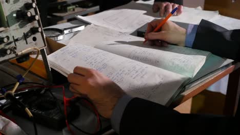 scientists taking notes in a lab