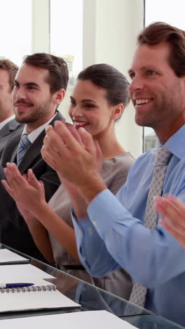 interview panel applauding the applicant