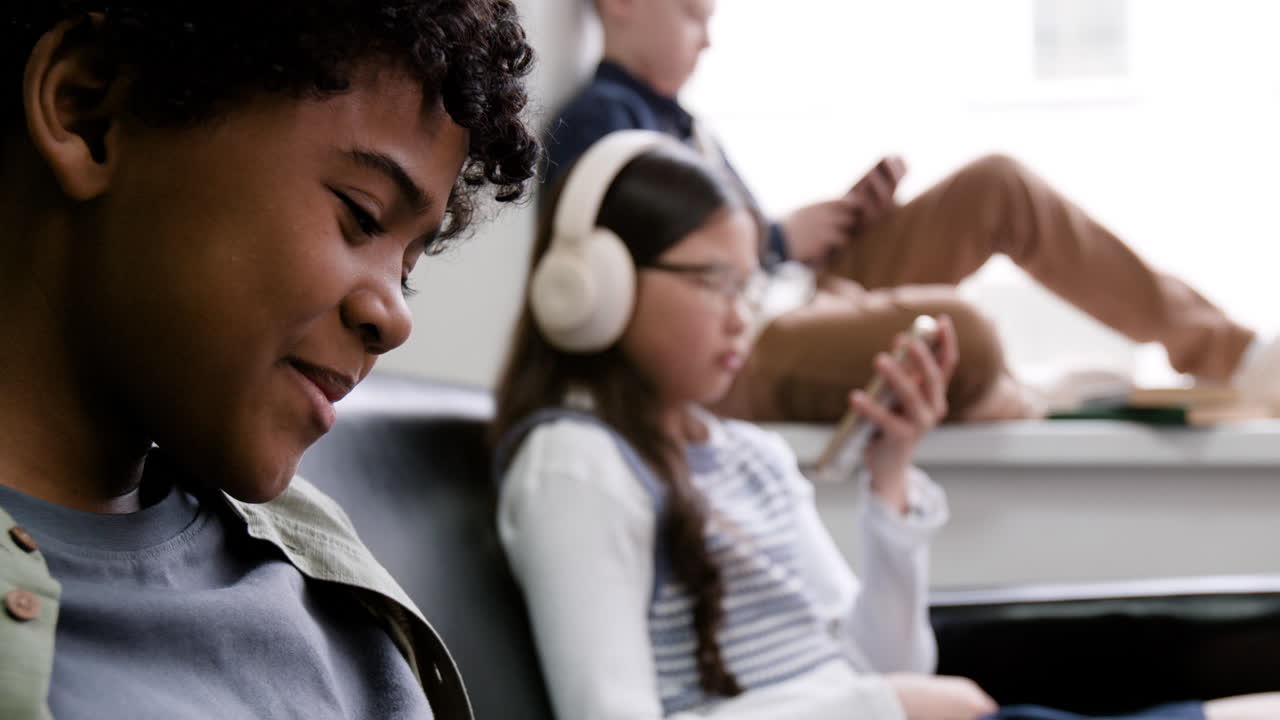 Children Engaged with Mobile Devices