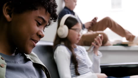 children engaged with mobile devices