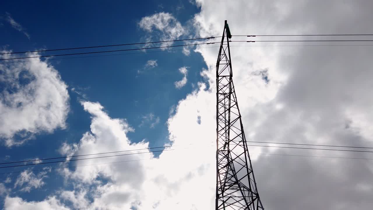 trasmissione electric high voltage tower zoom out