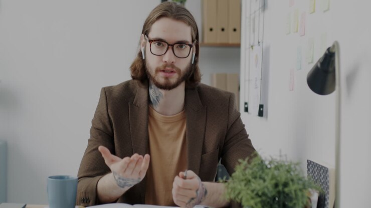 Man in video call in an office