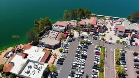 aerial drone rotation over businesses on community lake mission viejo