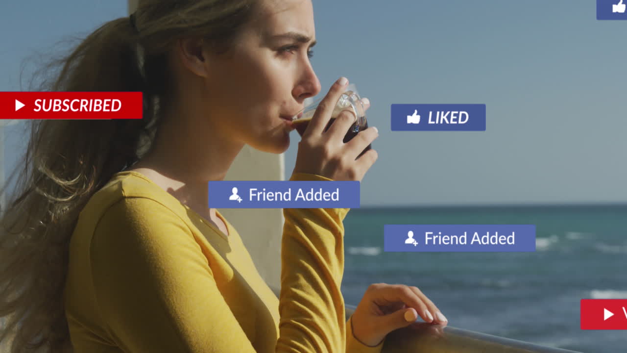 Animation of social media notifications over woman on holiday drinking coffee by the sea