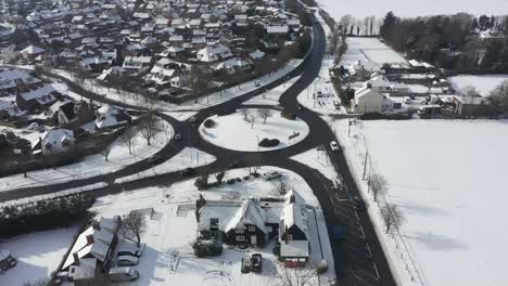 aerial pivot above snow covered roundabout