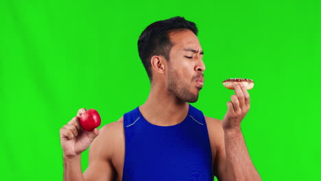 Asian-man,-apple-and-donut-on-green-screen