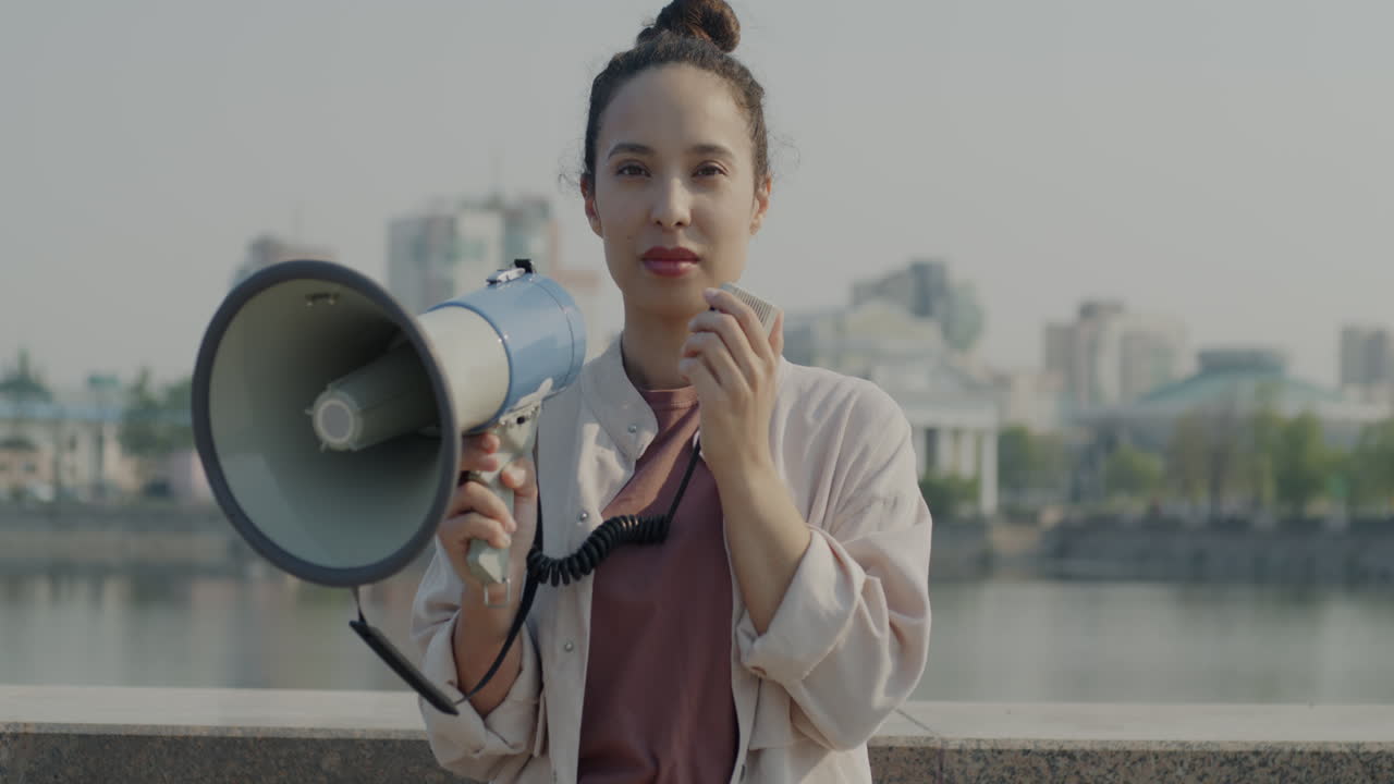 Woman Speaking with a Megaphone