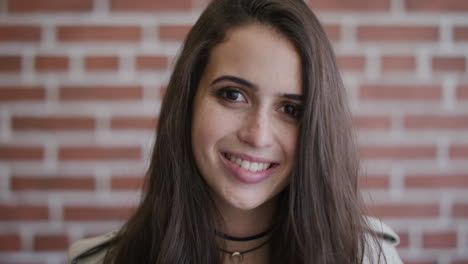 portrait-cute-young-girl-student-smiling-happy-enjoying-successful-lifestyle-cute-female-teenager-freckles-brick-wall-background