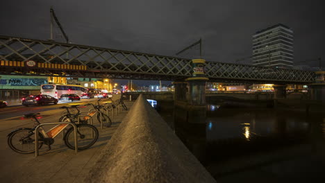 time lapse of nighttime road traffic and people walking by in dublin city centre in ireland