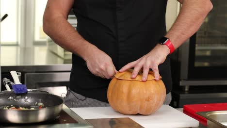 chef preparing a pumpkin