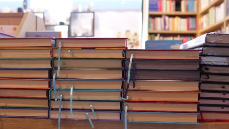 a stack of books in a bookstore