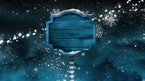 wooden sign with winter snow night sky