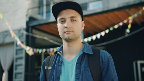 man standing outside a building
