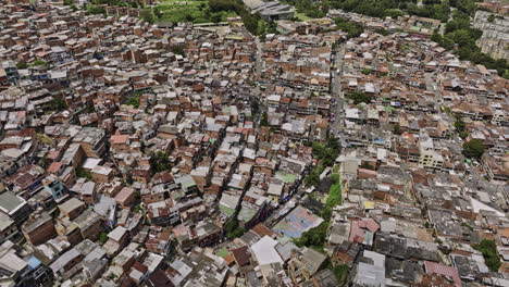 Medellin Colombia Aerial v36 birds eye view flyover capturing densely populated residential hillside of Comuna 13 San Javier with houses on steep slope - Shot with Mavic 3 Cine - November 2022