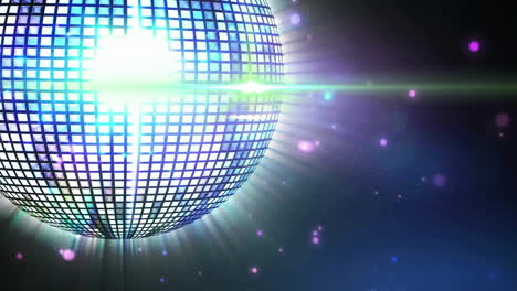 glowing disco ball with colorful lights animation over dark background with sparkles