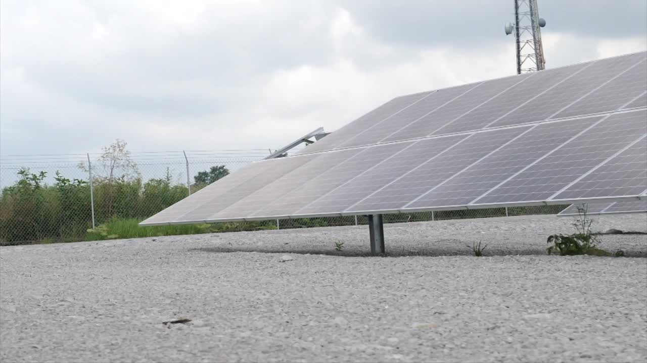 Solar Panel - driving by of lots of rows of panels