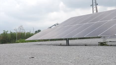 solar panel - driving by of lots of rows of panels