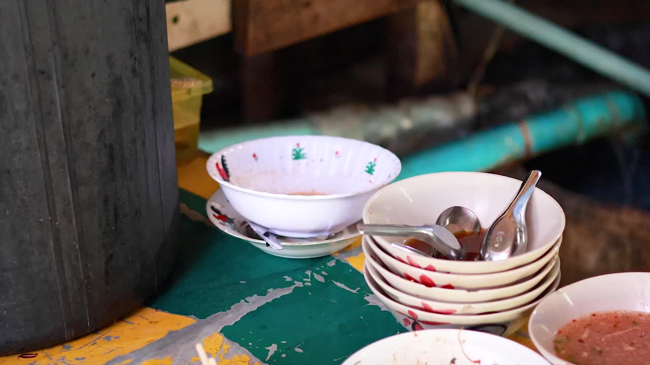 Stacked bowls and chopsticks on a table