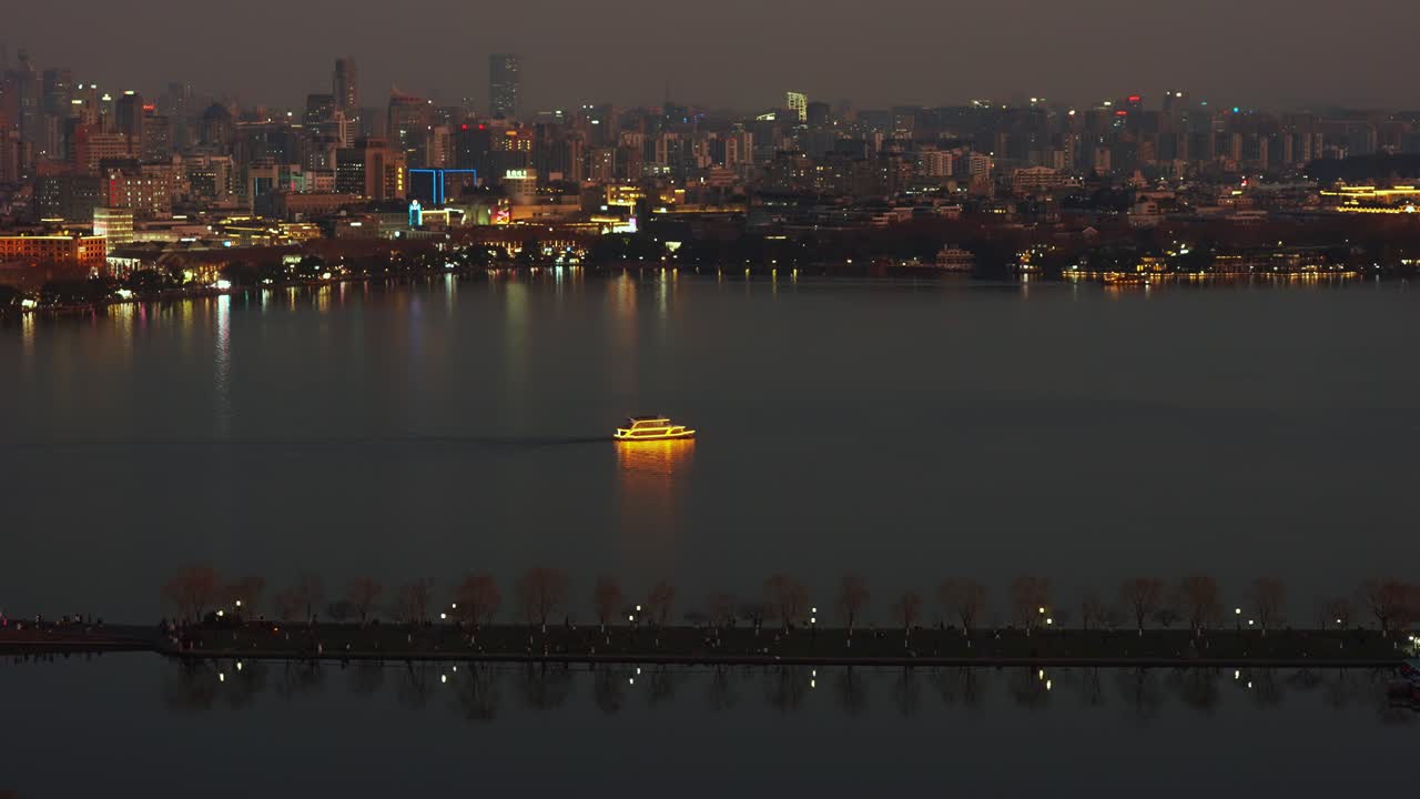 Wide Night Panorama of Hangzhou West Lake and Illuminated City Skyline