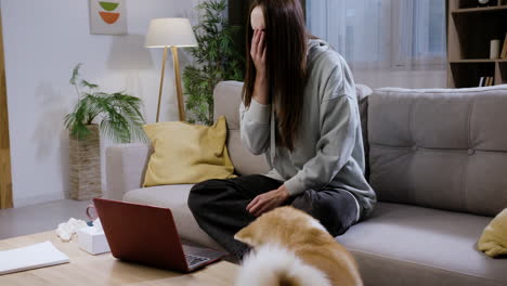 woman petting her dog