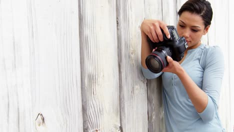 photographer taking photo with digital camera