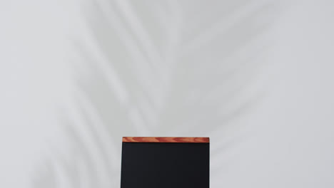 video of blackboard sign on wooden stand with copy space on white background