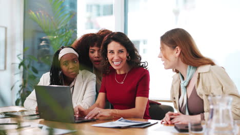 happy businesswomen celebrating success