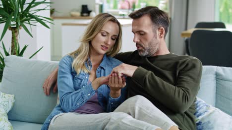 Mature-couple-talking-about-wedding-ring