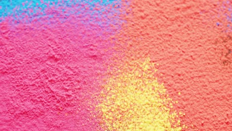 Video-of-close-up-of-multi-coloured-powders-with-copy-space