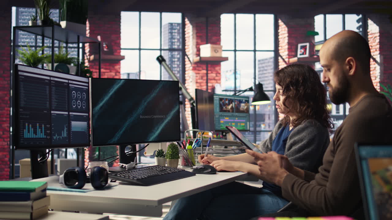 Team of analysts examining presentation charts and data on dashboard