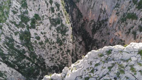 Aerial-Top-View-Above-The-Torrent-De-Pareis-Riverbed,-In-A-Cliffy-Canyon