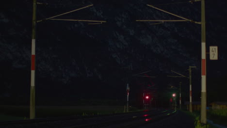 train tracks at night in the mountains