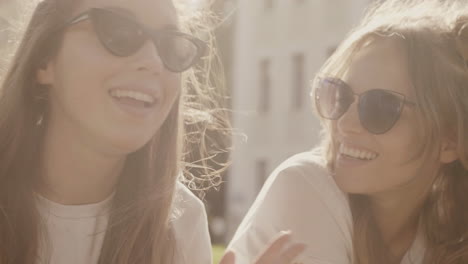 two women friends enjoying sunny day