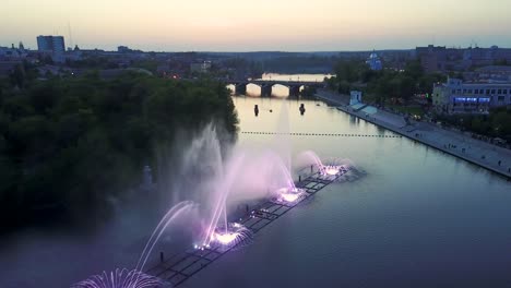 colorful and musical fountain. aerial shot of the light and music magic fountain at night