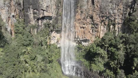 Aerial View of Stunning Waterfall Cascading Down a Cliff Face