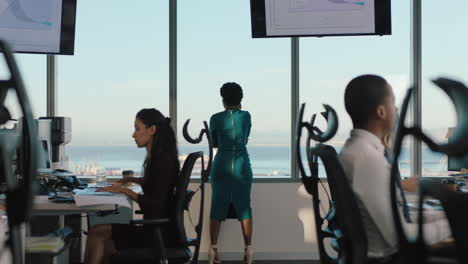 business woman using smartphone having phone call chatting to client on mobile phone looking out window female executive discussing sales in busy office