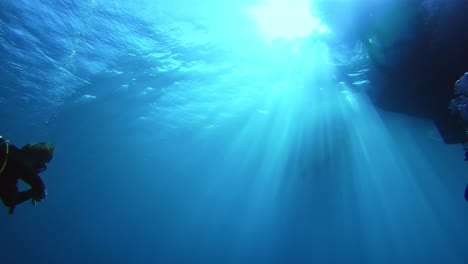 scuba diver checking his dive computer