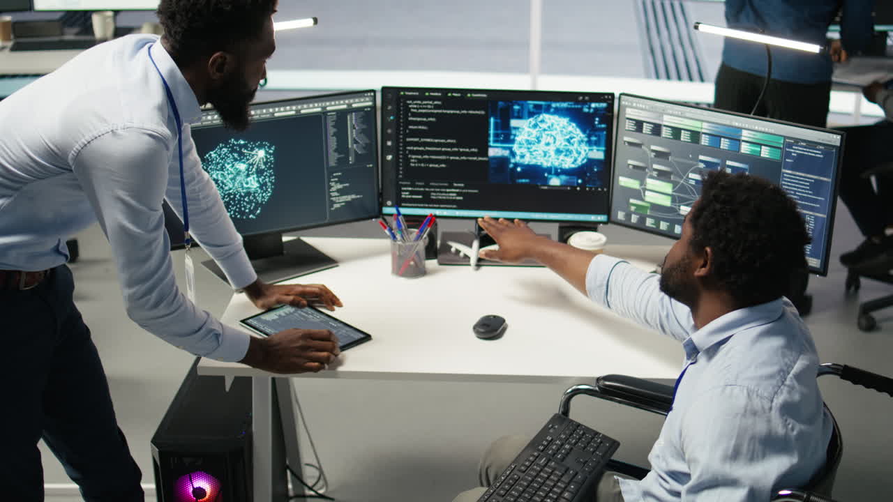 Technician in wheelchair and data center manager using AI node tree software