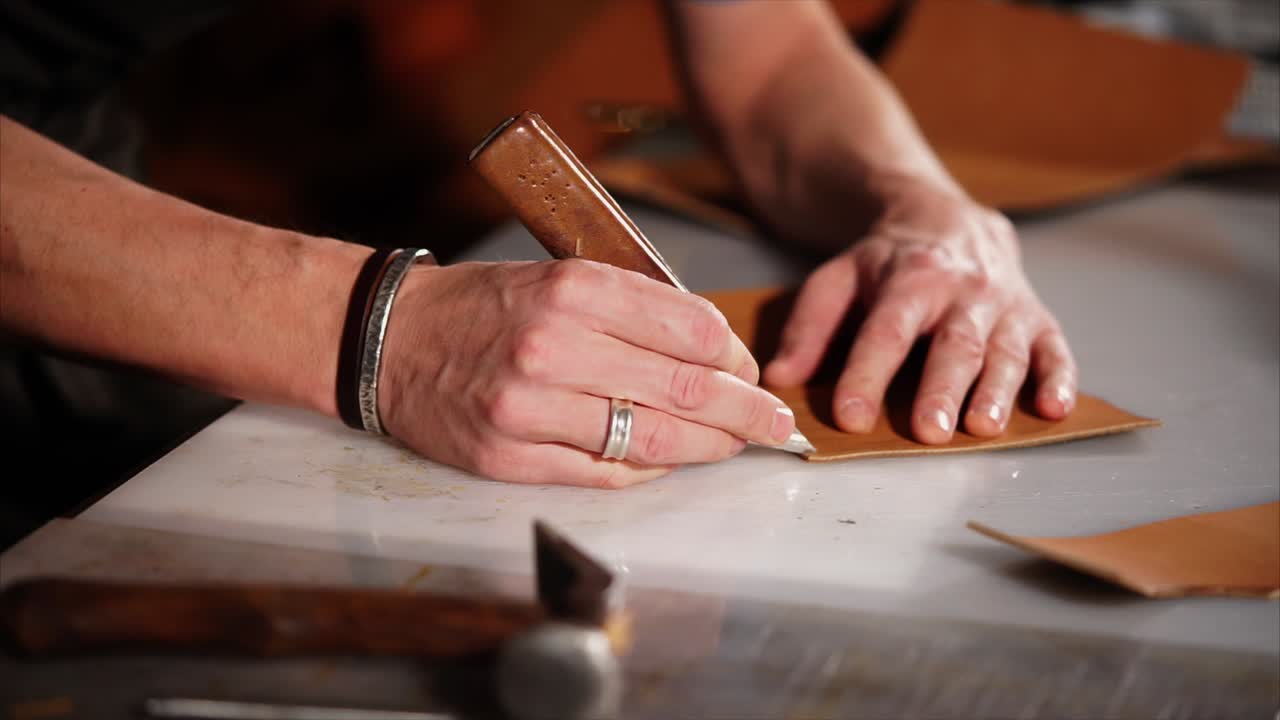 Artisan Leatherworker Cutting Leather