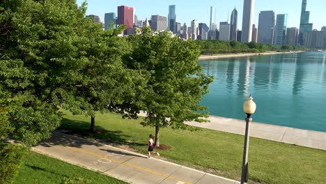 jogging and cycling by city lakefront